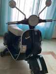 Vespa eletrica criança.
