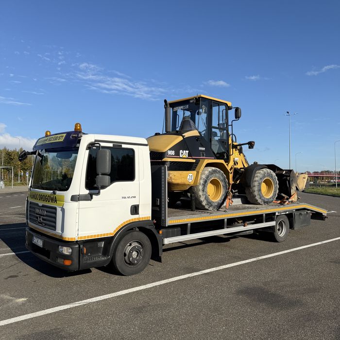 Pomoc drogowa, holowanie, laweta transport maszyn budowlanych rolnicze