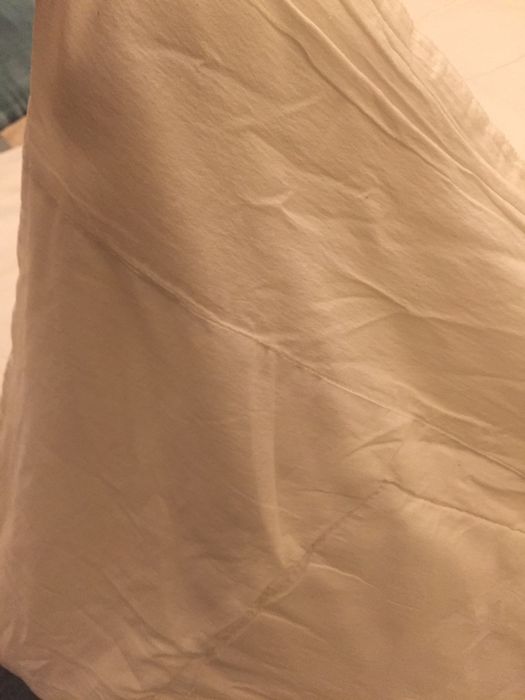 Edredão de cama de solteiro.