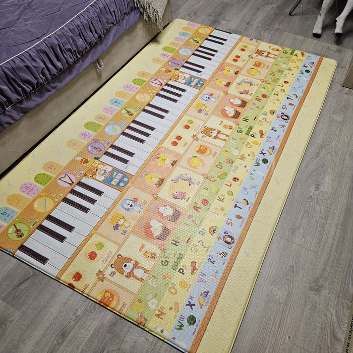 Розвиваючий килимок Dwinguler Music Parade