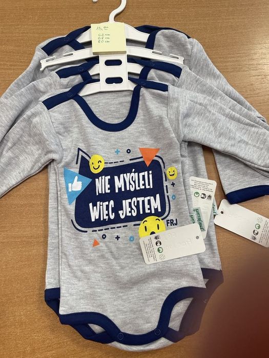 Body niemowlęce z napisami