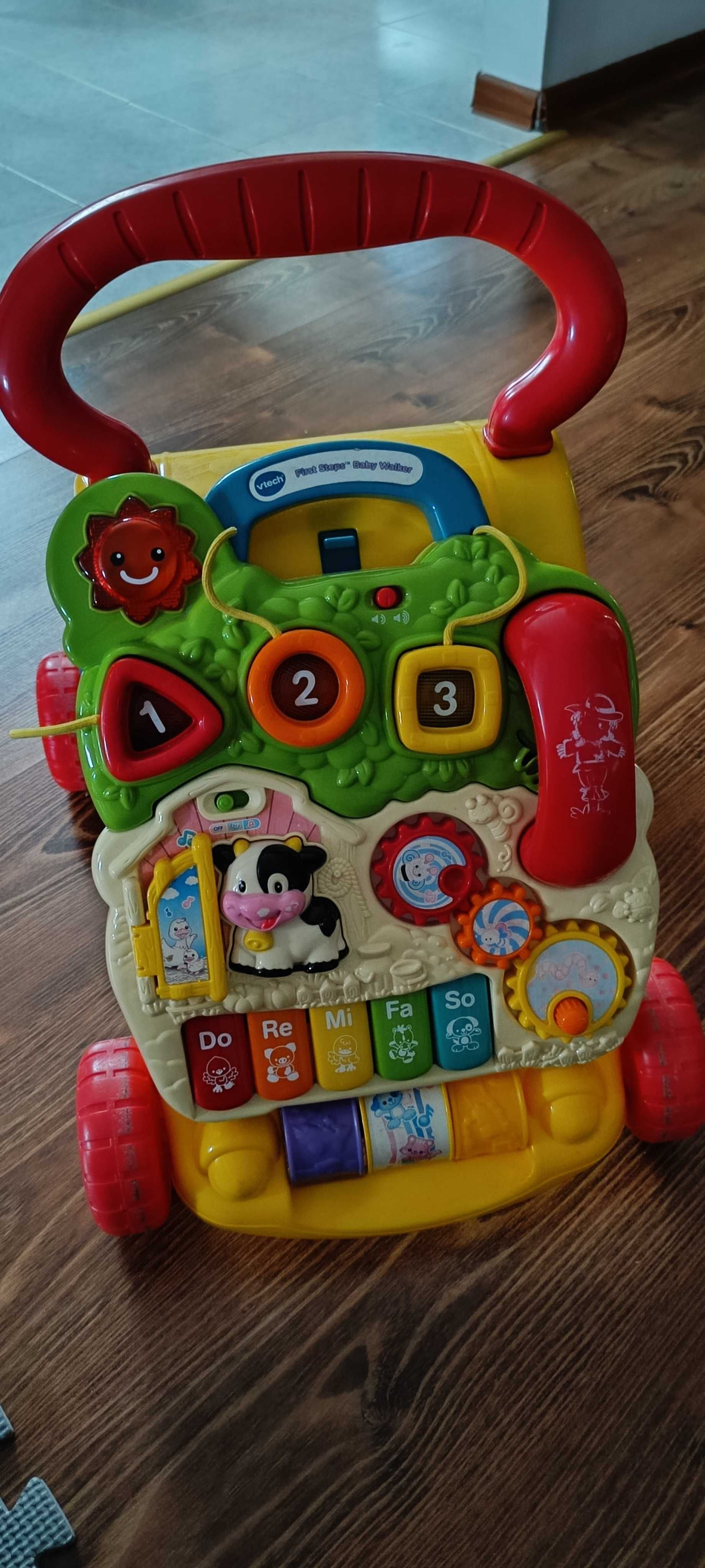 Pchacz jeździk vtech