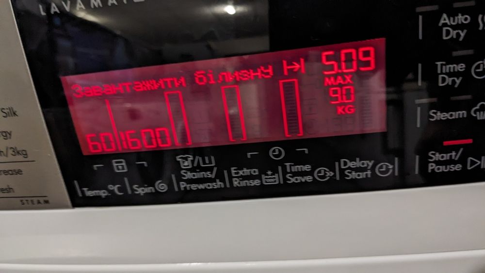 Прально-сушильна машина AEG. L99697HWD