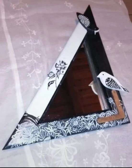 Lusterko ze starego okienka z ptaszkami