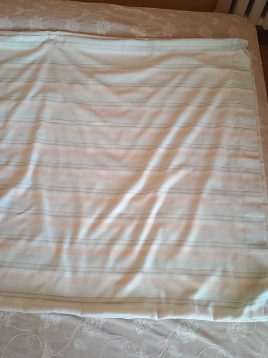 Дві довгі легкі світлі штори на люверсах 225*115см кожна з підкладкою