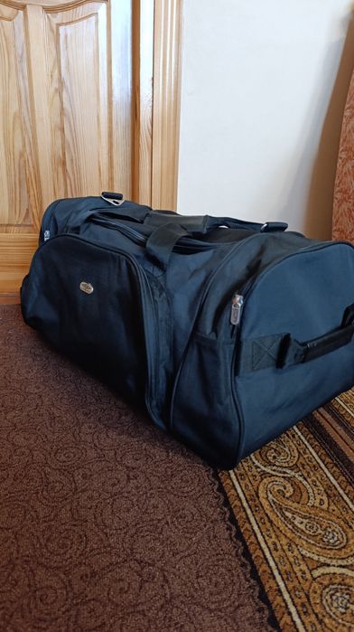 Дорожня сумка, валіза