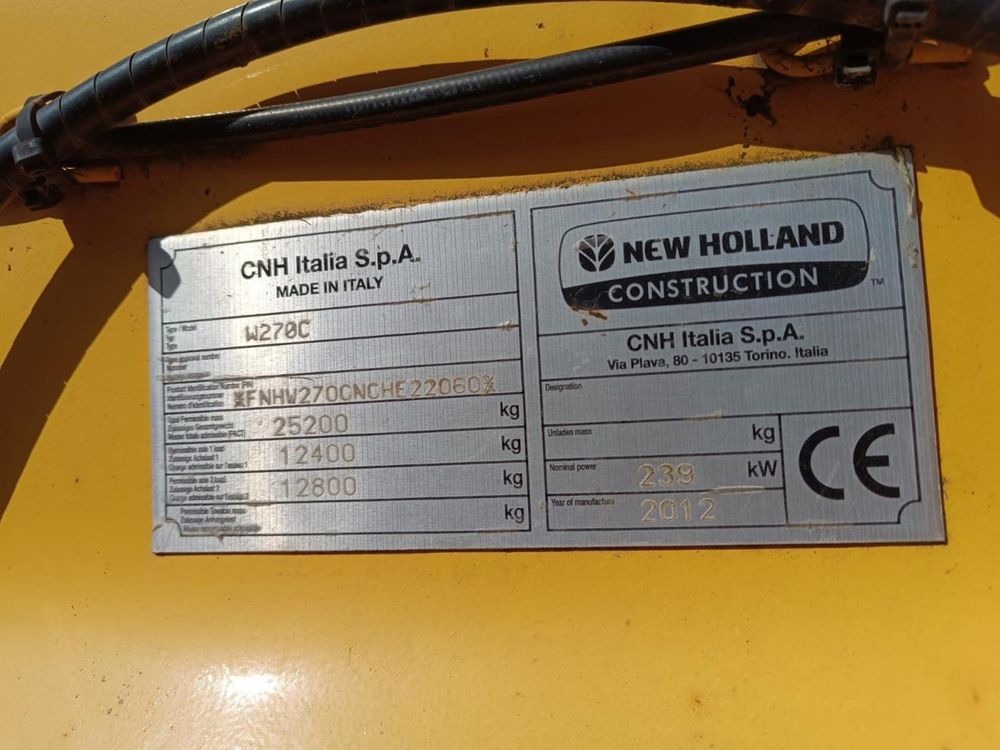 Трактор, погрузчик New holland w