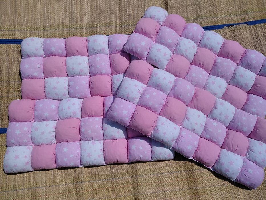 Бортики в ліжко для дівчинки