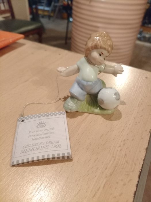 Boneco de porcelana feito á mão