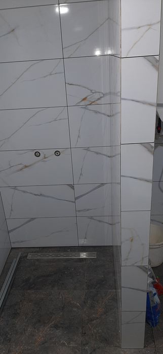 Штукатурка стін та стель, плиточні роботи.