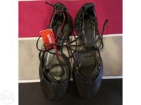 Sapatos de senhora novos