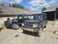 Na sprzedaz 2 auta daihatsu rocky jeden niesprawny