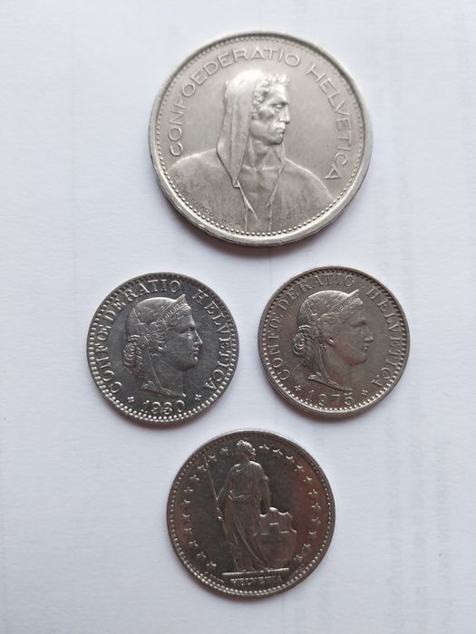 Moedas antigas dos Emirados Árabes Unidos, Suiça e comemorativa de Por