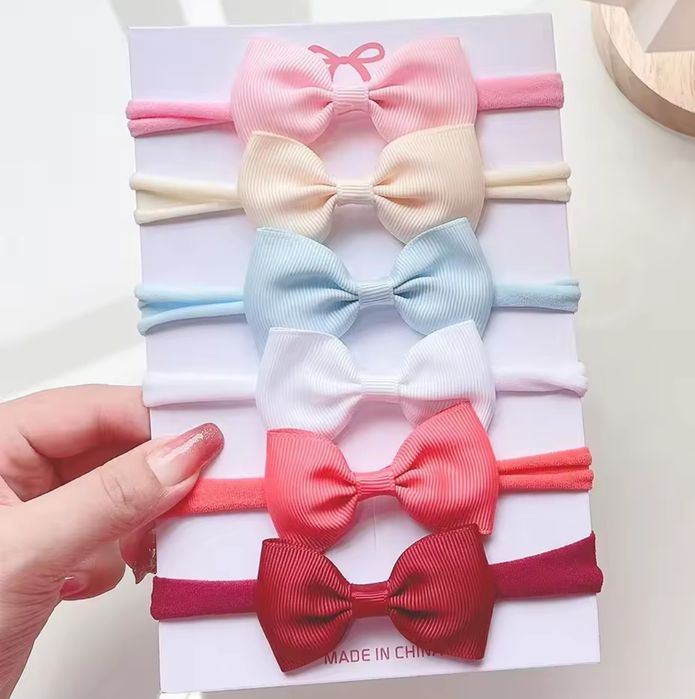 Opaski bezuciskowe kokardki do włosów dla dziewczynki. Opaski na głowę
