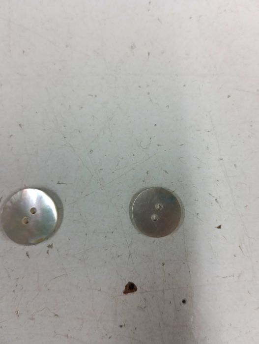 Botões transparentes com logotipo de Paris