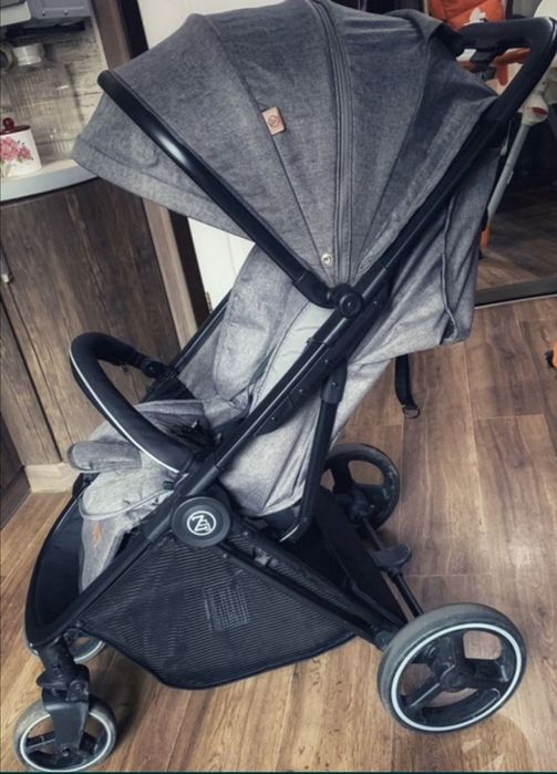 Прогулочная коляска BabyZz B100 универсальная книжка