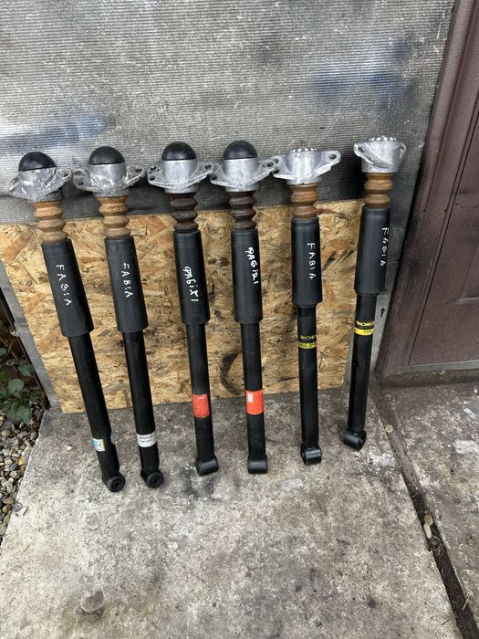 Амортизатор Фабія1 Поло Румстер Fabia Polo Rumster