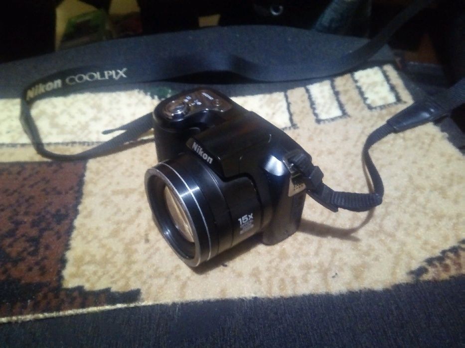 фотоаппарат Nikon coolpix L100 в рабочем состоянии
