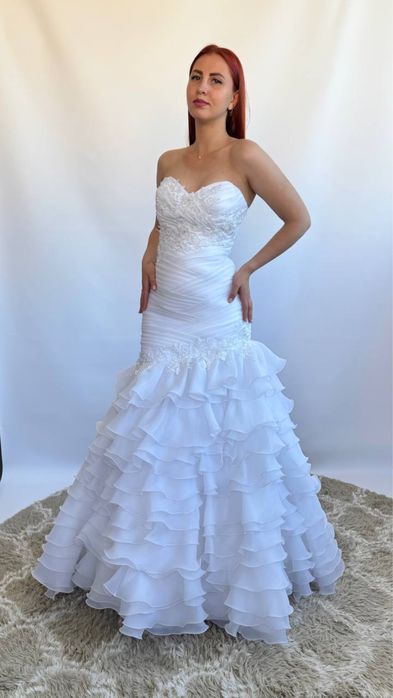 Продам весільні сукні нові