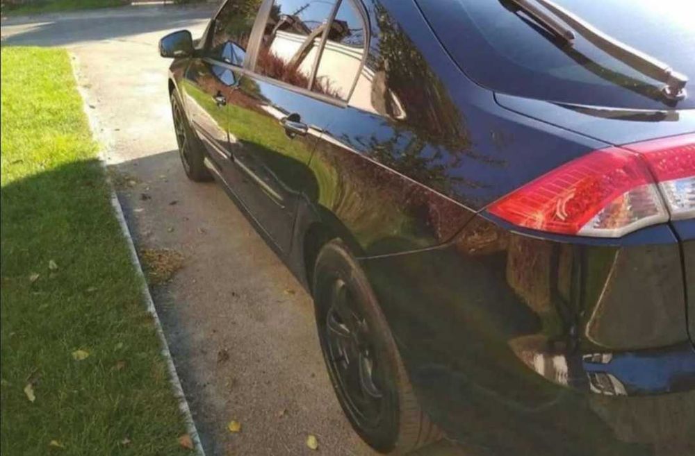 Renault Laguna lll 2008 1.5dci 6ст мех кожа чёрная на чёрном