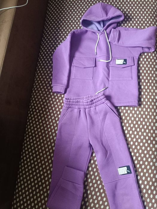 Спорт.костюми 2шт. фіолет та беж 140-146р.