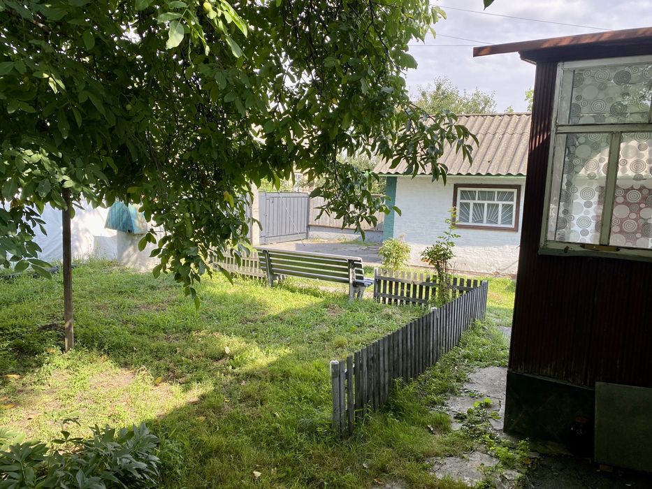 Будинок з усіма зручностями + земля в центрі м. Лубни.