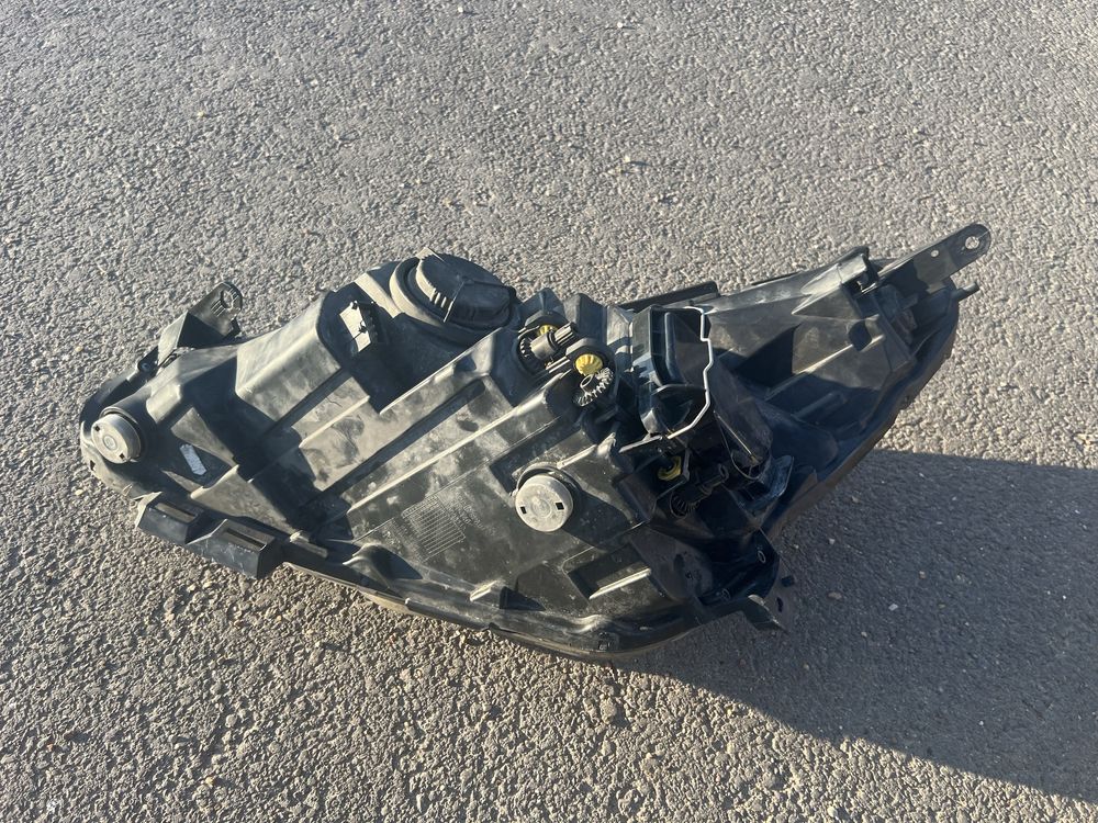Lampa przednia Opel Corsa D lift