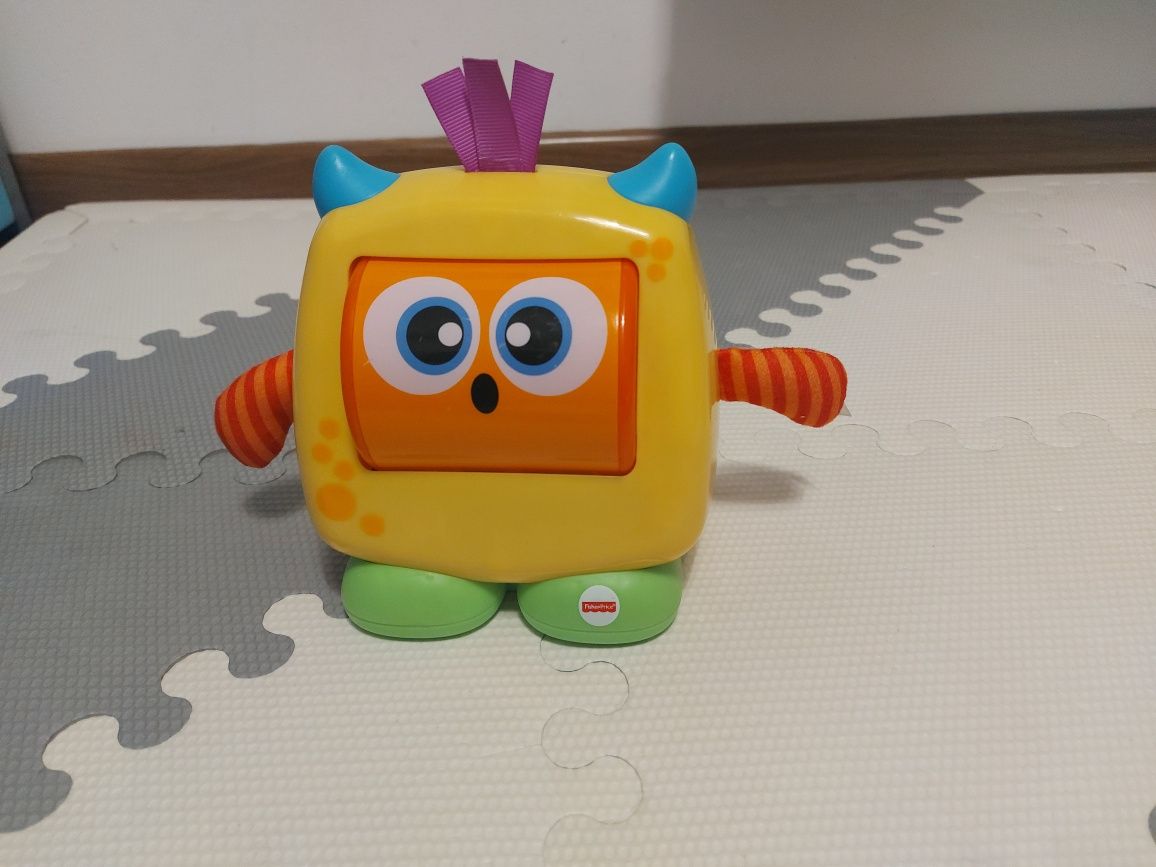 FISHER PRICE stworek humorek dzwięki zabawka interaktywna