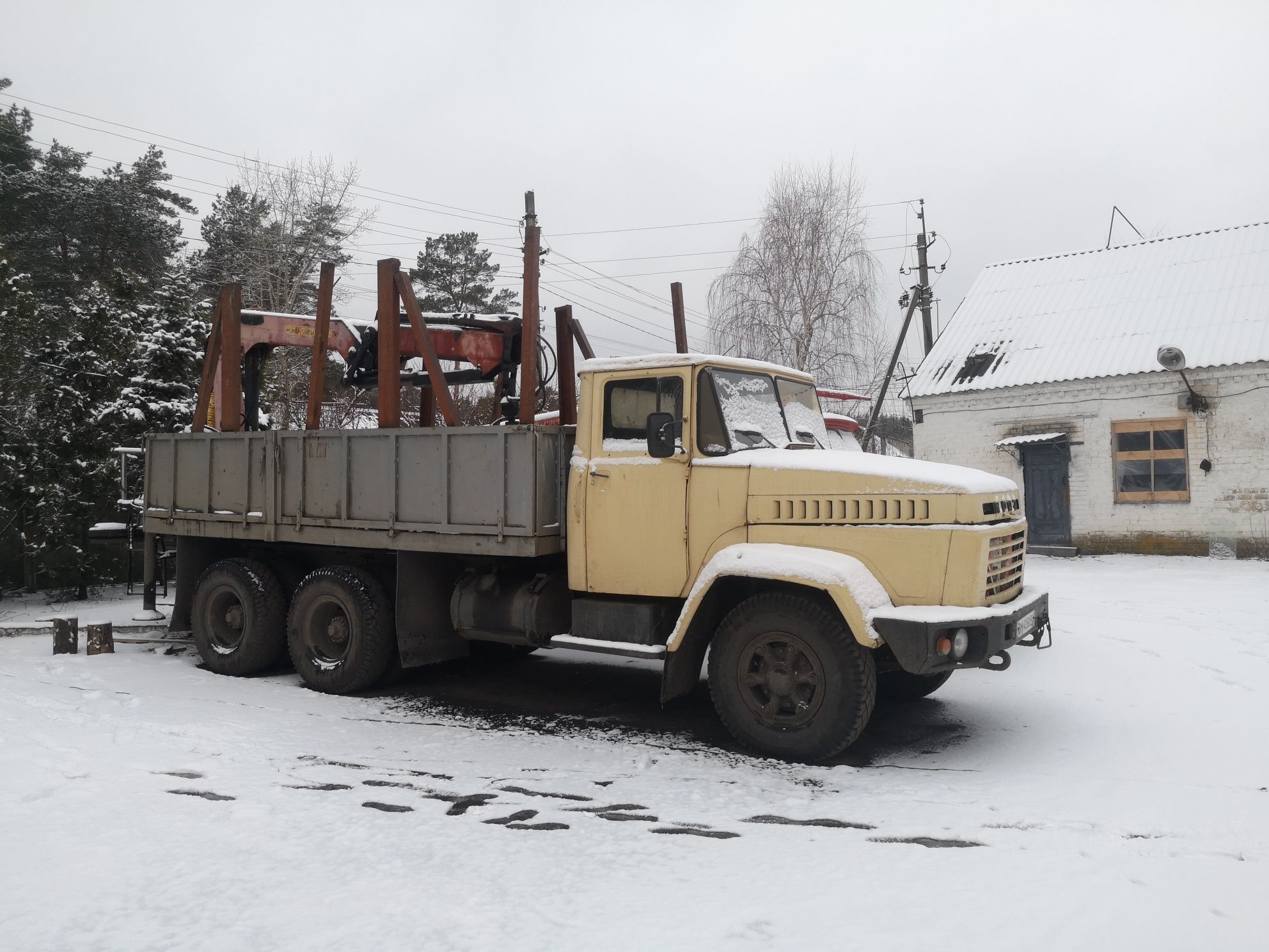 Краз маніпулятор лісовоз