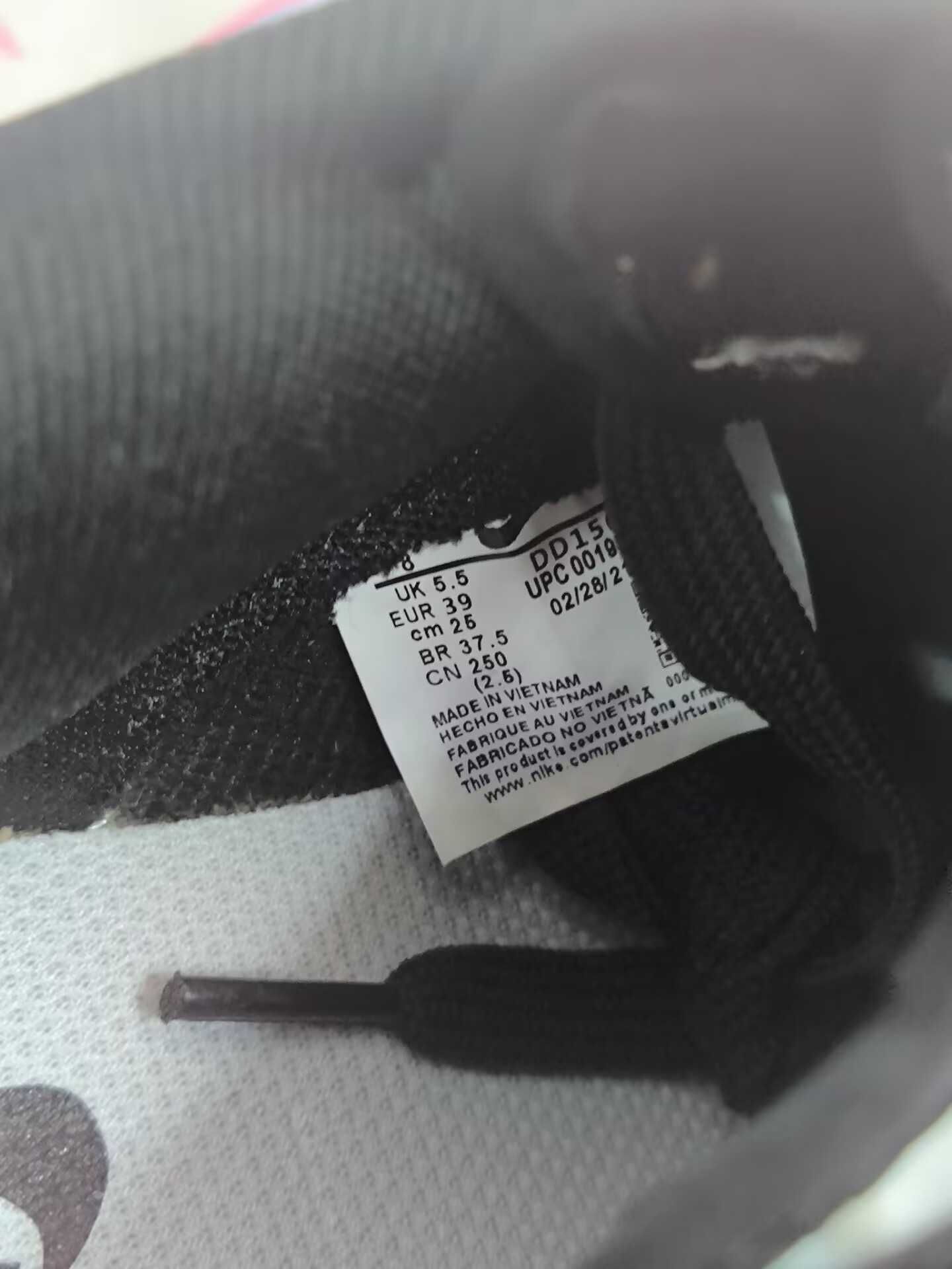 Damskie biało-czarne trampki Nike, rozmiar 39