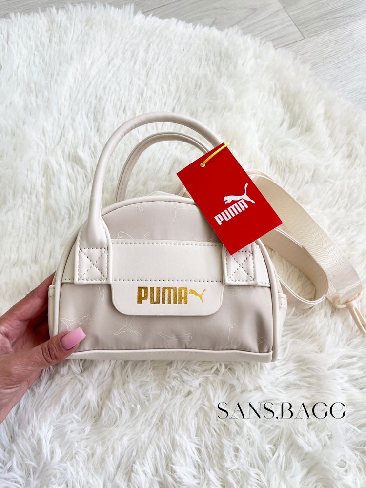 Сумка від бренду Puma в молочному кольорі