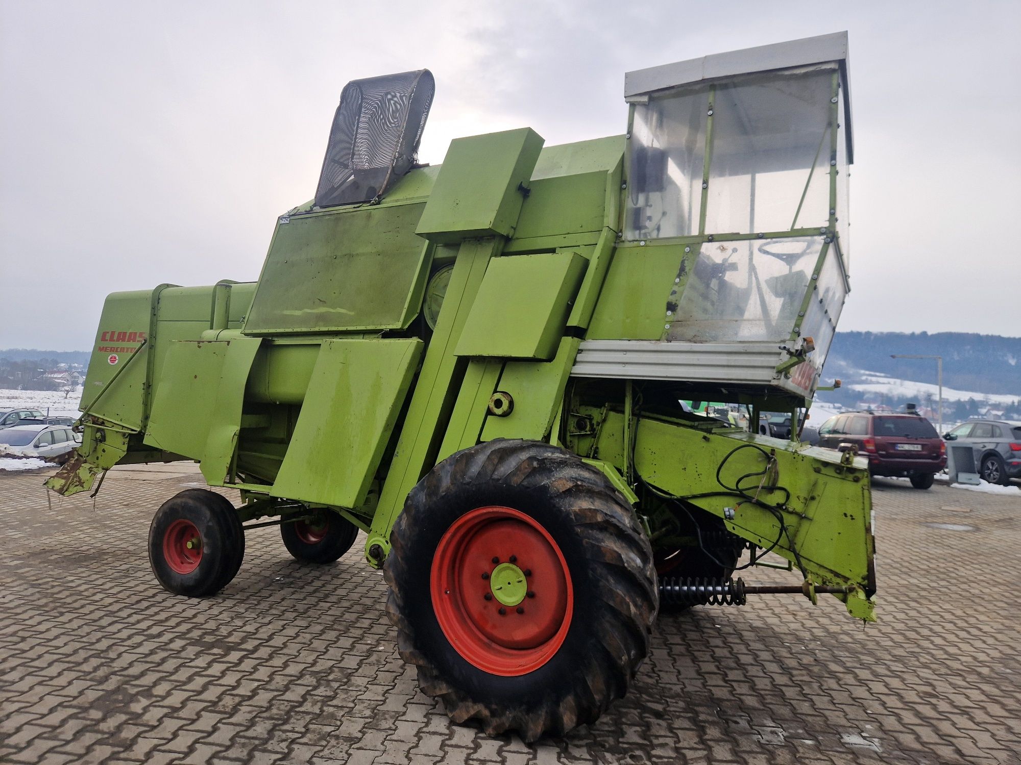Kombajn zbożowy Claas Mercator 70 z Niemiec