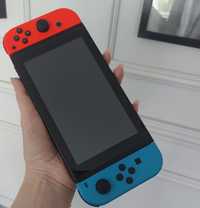 Nintendo SWITCH Neon Red & Blue Joy-Con + 2 gry

• dysk twardy: 32 GB