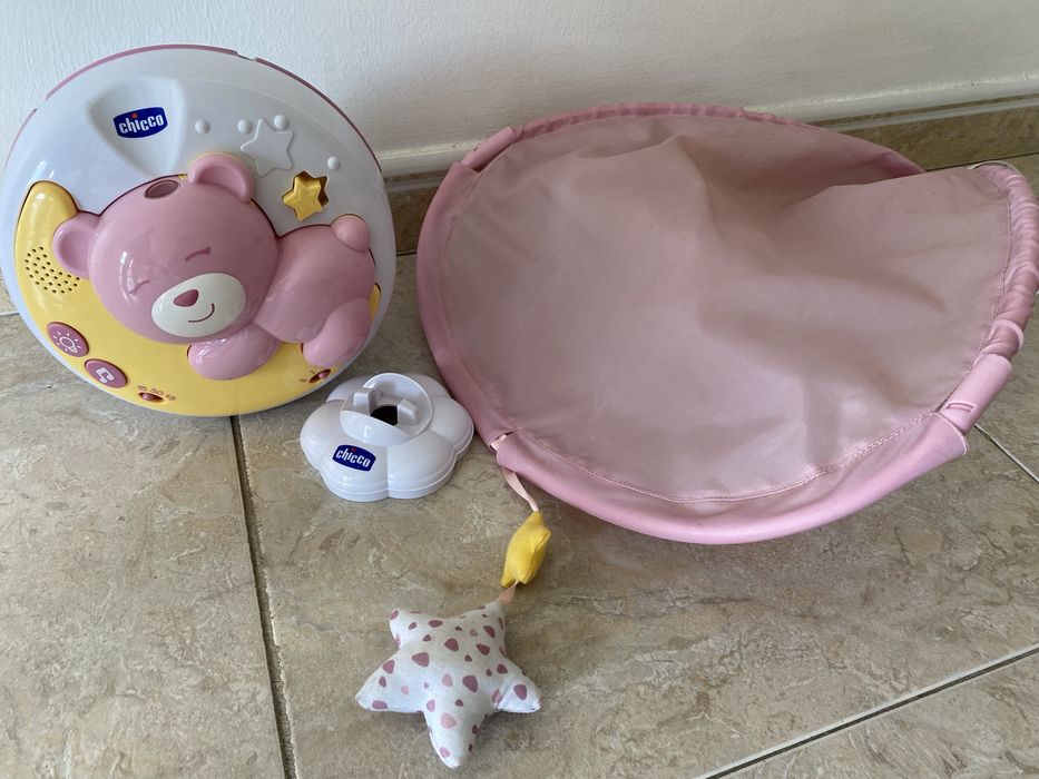 Projetor chicco next2moo