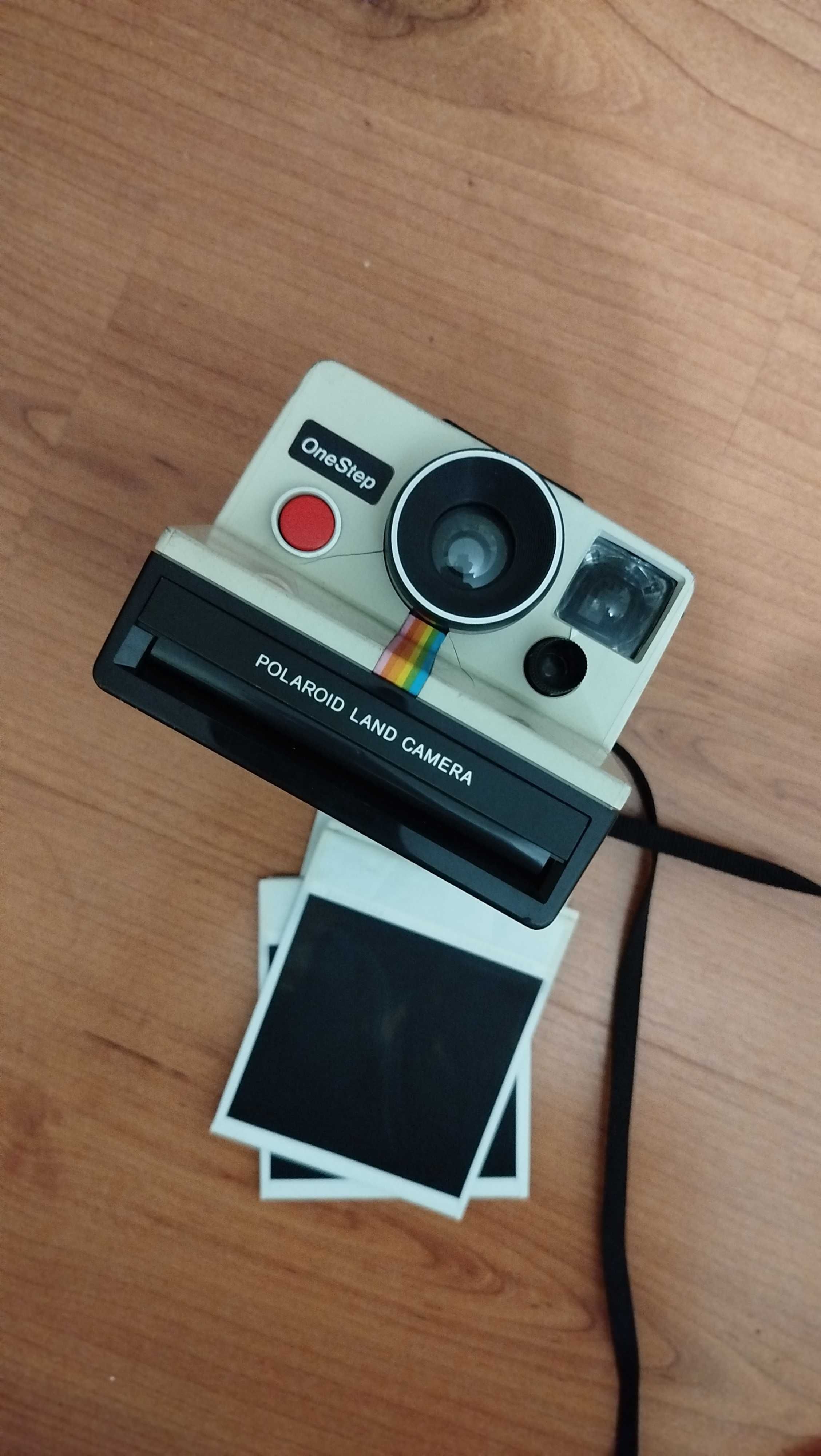 Máquina fotográfica polaroid onestep