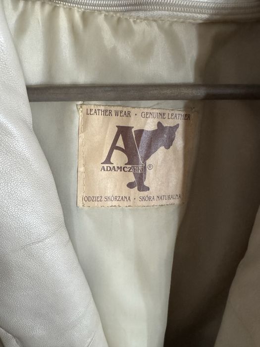 Beżowy skórzany płaszcz S 36