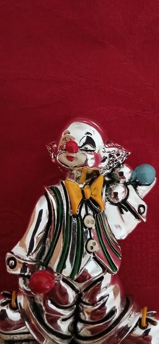 Palhaço de prata laminada com afia-lápis