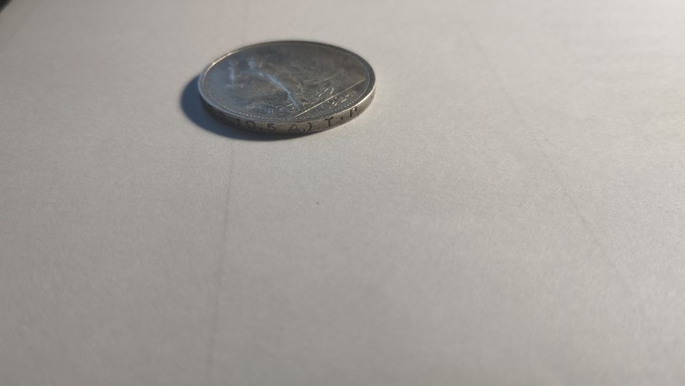 Срібний полтинник 1924 з ініціалами Т•Р та  датою