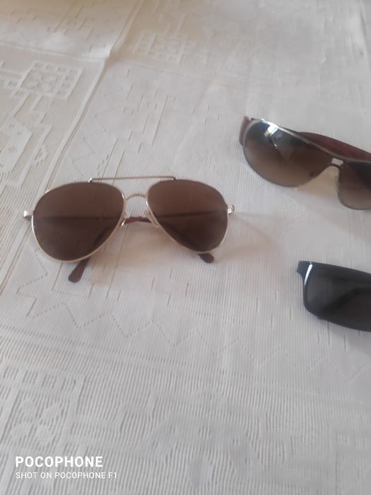 Três oculos um marca prada