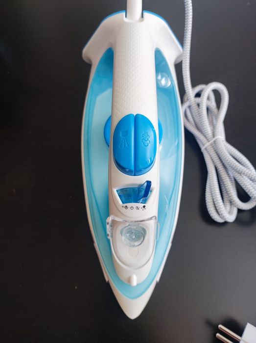 Продам утюг Braun новый из Германии.