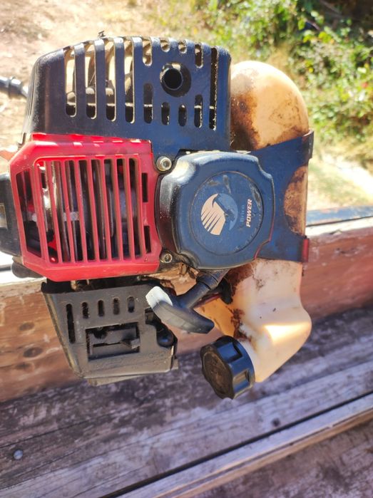 Moto enchada com charrua e frese