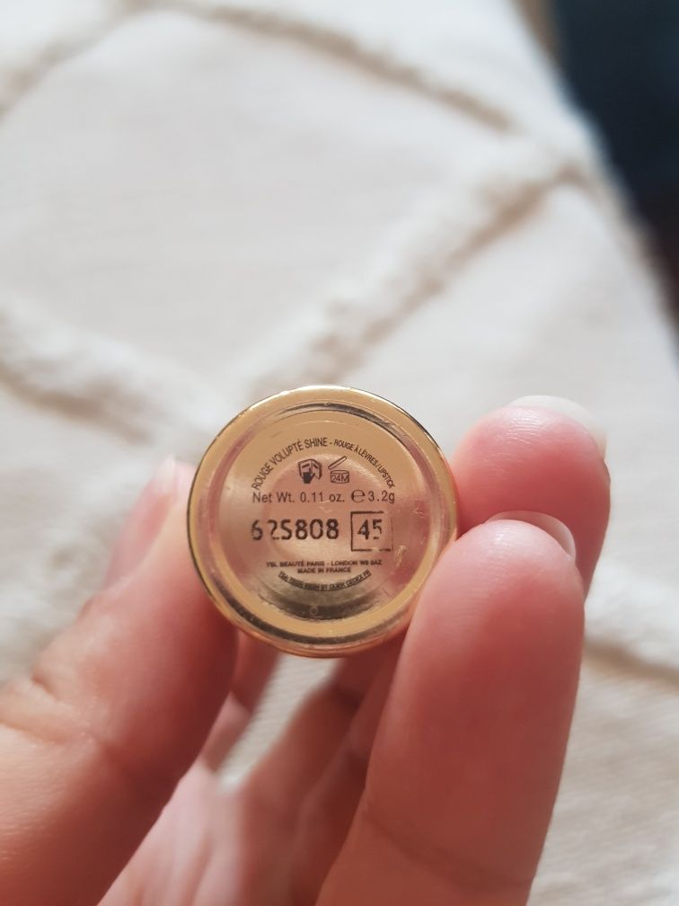Opakowanie po szmince YSL złote metalowe ciężkie