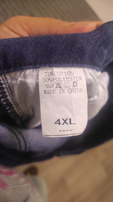 Джинси 56 розміру(укр) з необробленим краєм кльош, стан нових