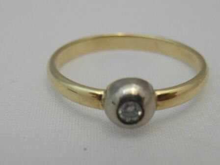 Złoty pierścionek z brylantem 2,50 g r 17