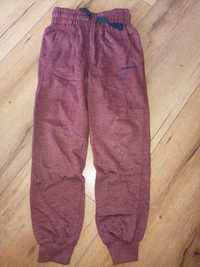 Nowe ciepłe spodnie dresowe r.122 Donnay