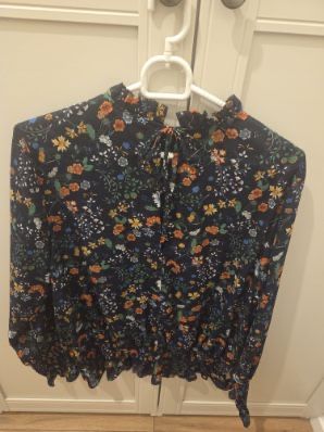 Elegancka bluzka w kwiaty hm 44 zwiewna