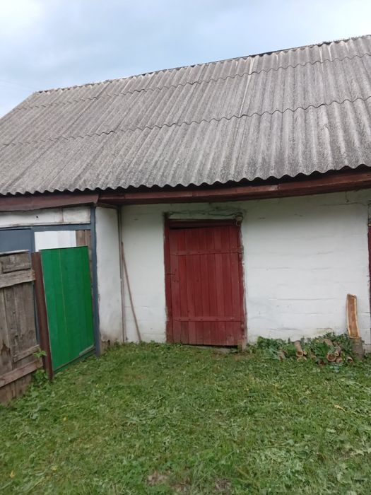 Будинок та земельна ділянка