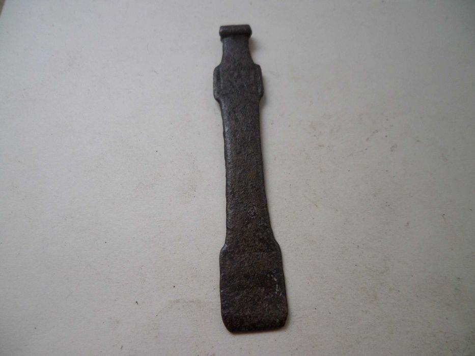 'Peça' antiga em Metal