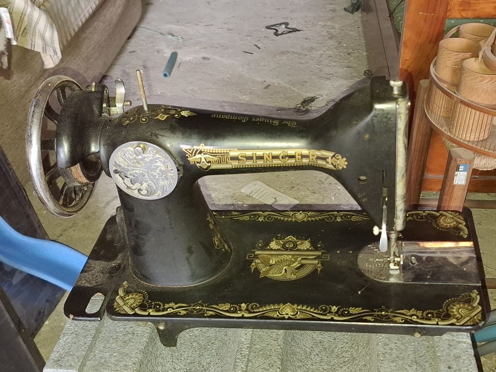 Cabeça de máquina de costura Singer