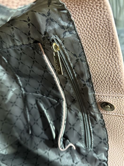 Жіноча сумка OCHNIK рожева з ремінцем